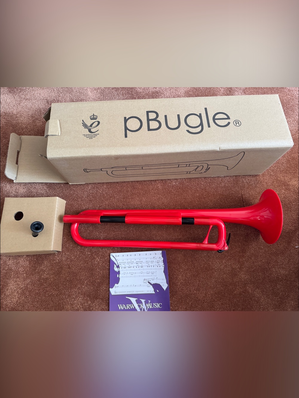 Brand new never used pBungle plastic kids Trumpet red